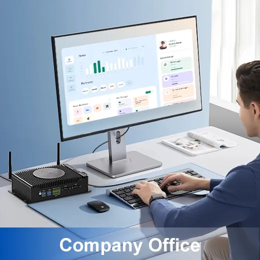HYSTOU H6 Fan mini PC used in a company office environment, with a professional working on a monitor displaying business analytics dashboards.