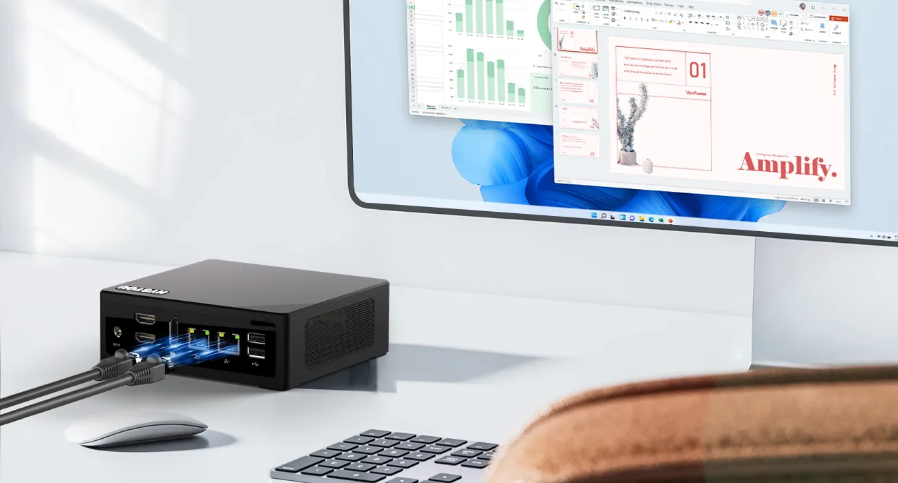 HYSTOU M2 mini PC connected to a monitor and keyboard, running office productivity software, featuring dual HDMI and dual LAN ports for efficient business workflow.
