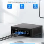 Robust network connectivity on the HYSTOU M2 office PC with built-in WiFi 6, Bluetooth 5.2, and 2x Gigabit Ethernet ports. Includes a speed comparison chart showing WiFi 6 reaching 9.6Gbps versus WiFi 5 at 3.5Gbps.