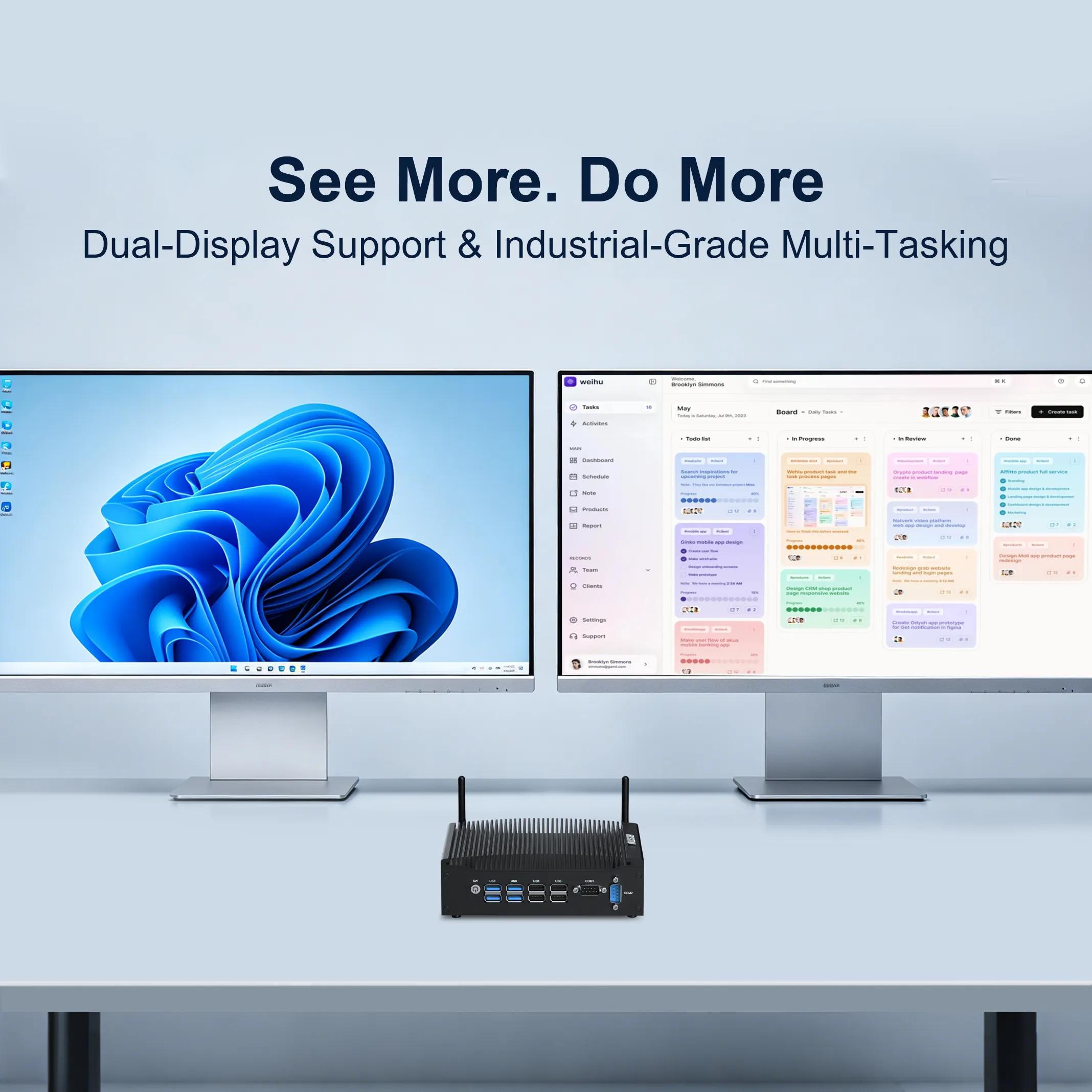 Hystou H7 fanless mini PC placed between two monitors, demonstrating dual-display support and industrial-grade multi-tasking. The left monitor shows the Windows 11 desktop, while the right monitor displays a project management dashboard. The image features the text "See More. Do More."