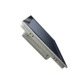 Angled side view of the HST-1501 industrial panel PC, highlighting its true-flat front panel and fanless metal heatsink chassis